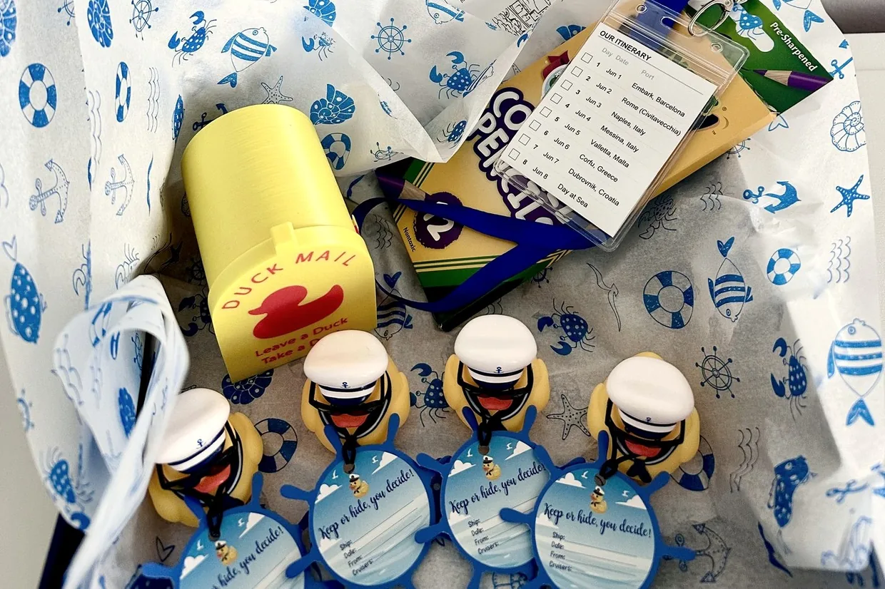 Open Little Ports box with Duck Mail mailbox, sailor ducks, lanyard and colored pencils
